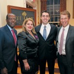 Anthony Welters ’77, Trustee Board Chairman; Joshua Espinosa ’15 with his mother, Millie; Trevor Morrison, Dean and Eric M. and Laurie B. Roth Professor of Law